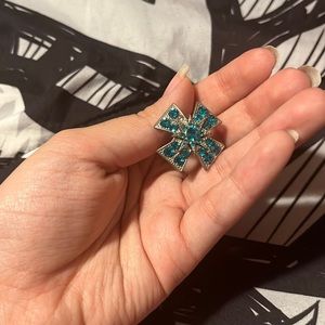 Silver ring with blue diamonds